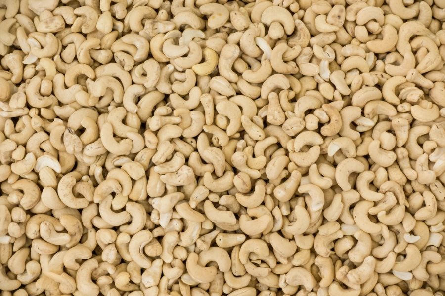 Whole cashew nuts filling the frame